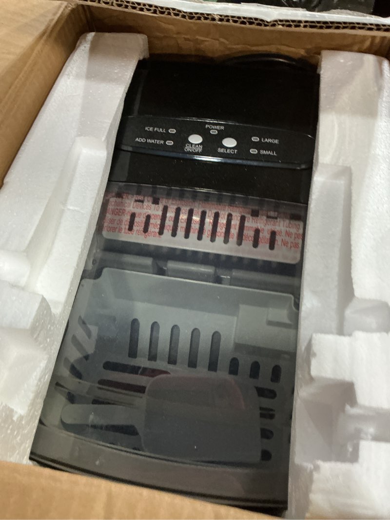 Condition photo showing As Is for Frigidaire Countertop Portable, 26 lb per Day Bullet Ice Maker Machine (Black Stainless Steel)