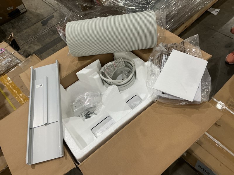 Condition photo showing New/Like New for lg 6,000 btu doe 8,000 btu ashrae portable air conditioner, 115v, cools 250 sq.ft. (10' x 25' room size), quiet operation, lcd remote control, and window installation kit, white up to 250 sq. ft. cool only bright white