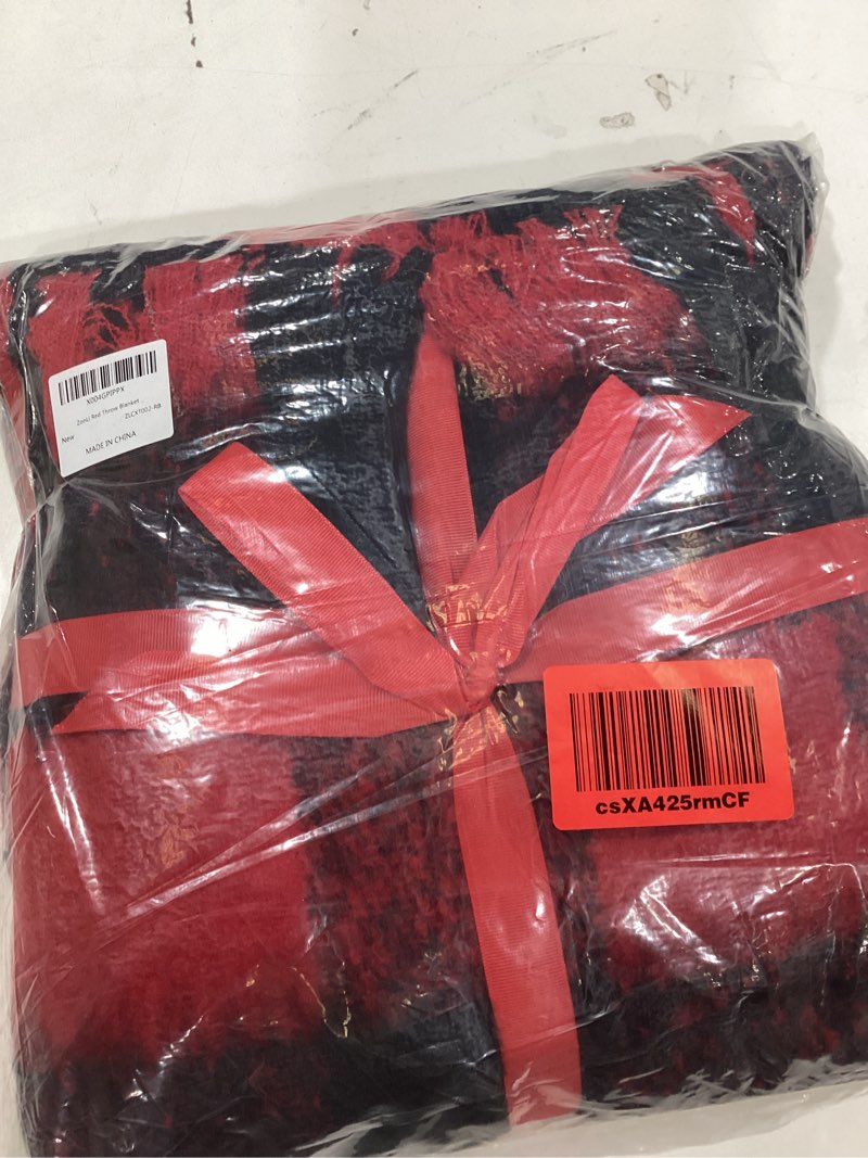 Condition photo showing As Is for ZonLi Christmas Red Plaid Blanket for Couch,Super Soft Cozy Decorative Throw Blankets with Tassel for Couch, Bed, Sofa, Chair, Outdoor, Cozy Warm Lightweight Farmhouse, 50" x 60" Red& Black 50"x60"