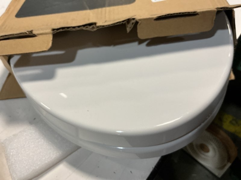 Condition photo showing As Is for delta faucet morgan elongated slow-close white toilet seat with non-slip seat bumpers, white 811903-wh transitional slow close
