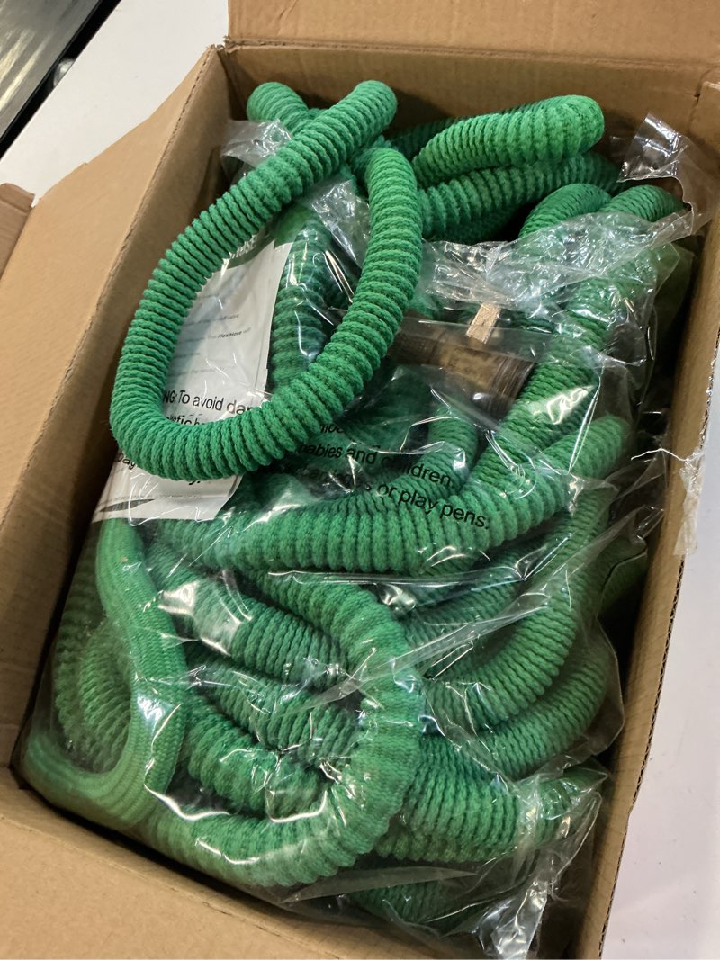 Condition photo showing Good Condition for flexi hose with 8 function nozzle, 150ft - lightweight expandable garden hose, no-kink flexibility, 3/4 inch solid brass fittings and double latex core - green green 150ft