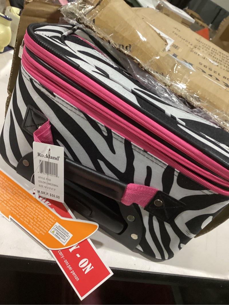 Condition photo showing Good Condition for Rockland Fashion Softside Upright Luggage Set, Pink Zebra