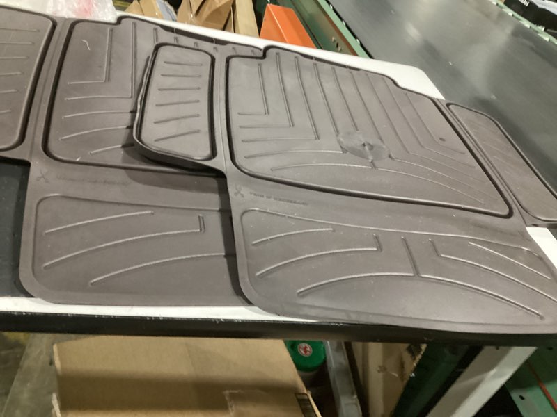 Condition photo showing Good Condition for weathertech child car seat protector, black seat black