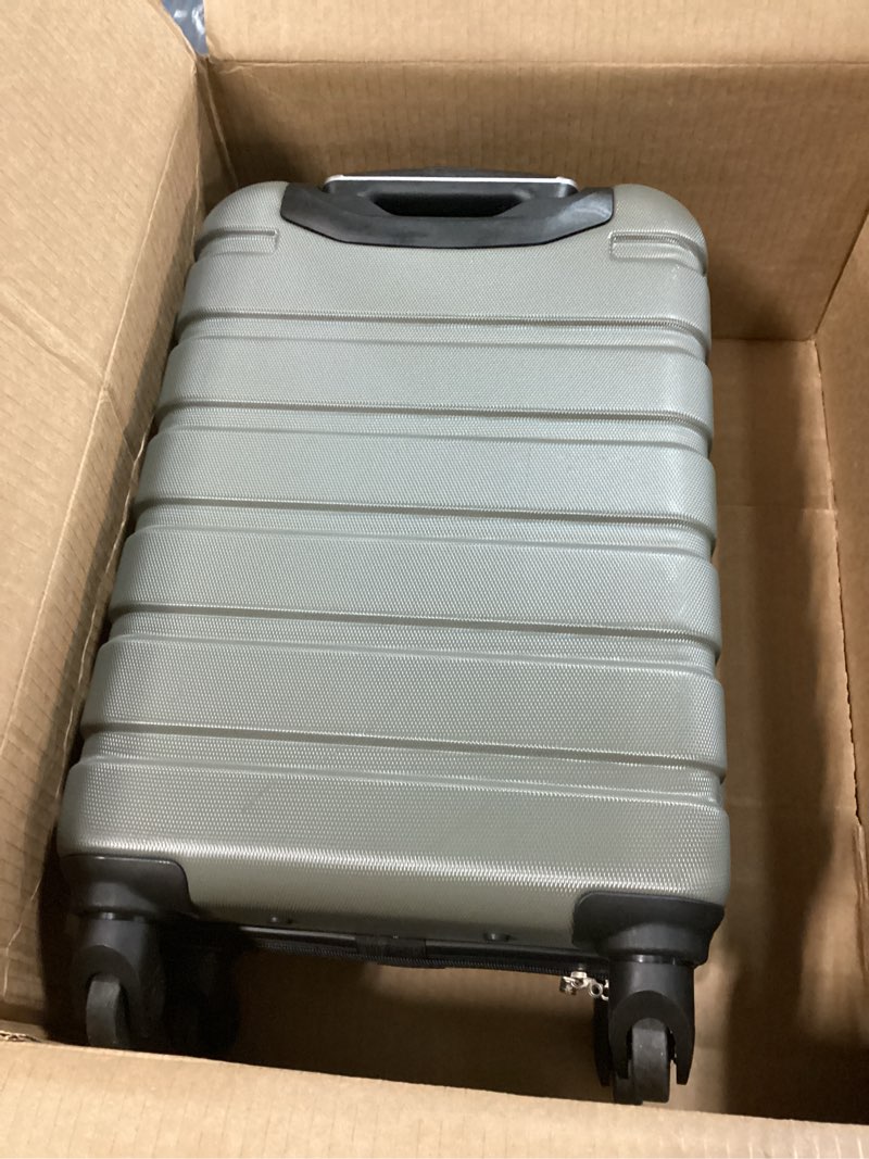 Condition photo showing Good Condition for wrangler 22" hardside spinner carry-on luggage, olive
