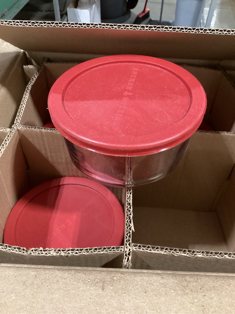 Condition photo showing Good Condition for 4 piece glass food storage container set with red lids