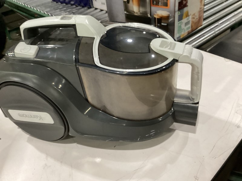 Condition photo showing As Is for Used not tested Kenmore DC5070.01 Upgrade 500 Series Bagless Canister Vacuum with Hair Eliminator Brushroll?2-Motor Cyclonic Technology, HEPA Filtration & 24' Auto Cord Rewind for Pet, Carpets, Hard Floors, Stairs Hair Eliminator Bagless Canister