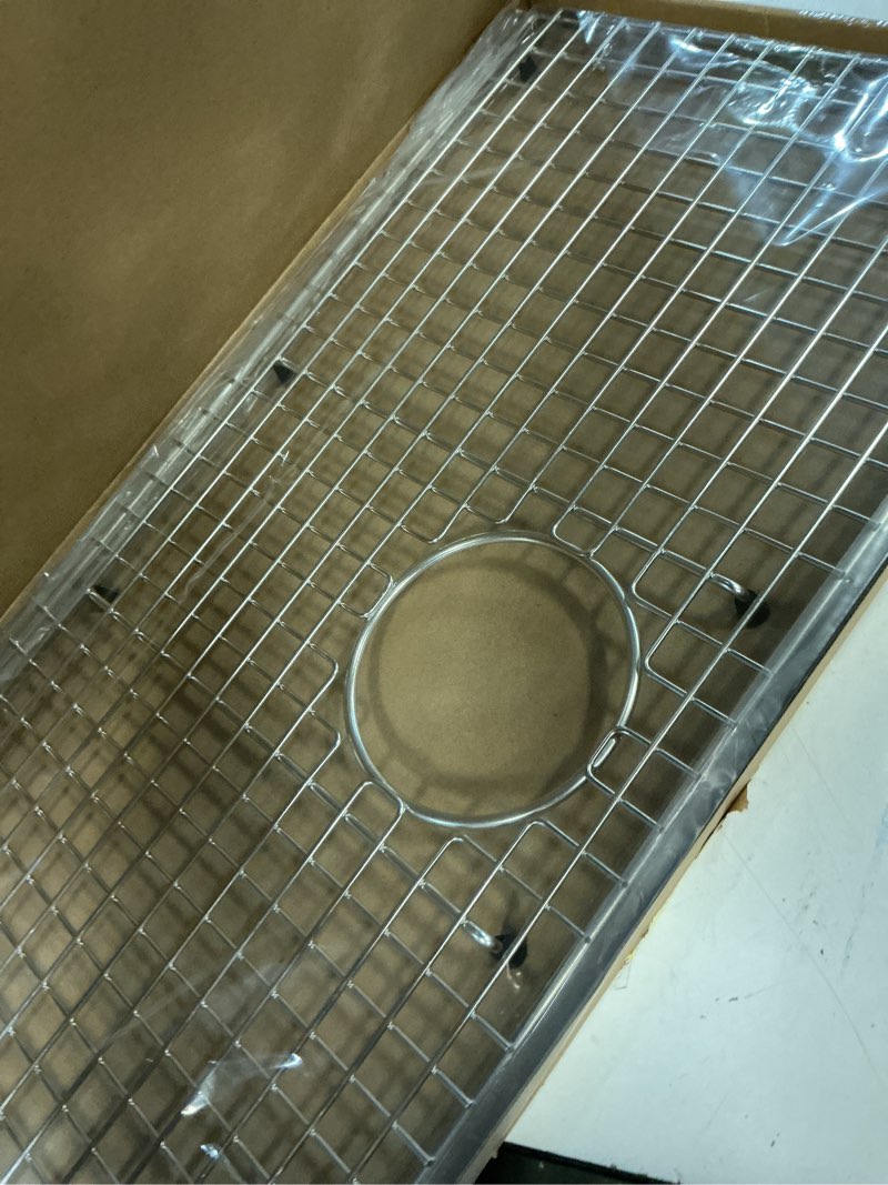 Condition photo showing New/Like New for serene valley sink bottom grid 28-3/8" x 14-3/16", rear drain with corner radius 3/8", sink protector ndg2915r