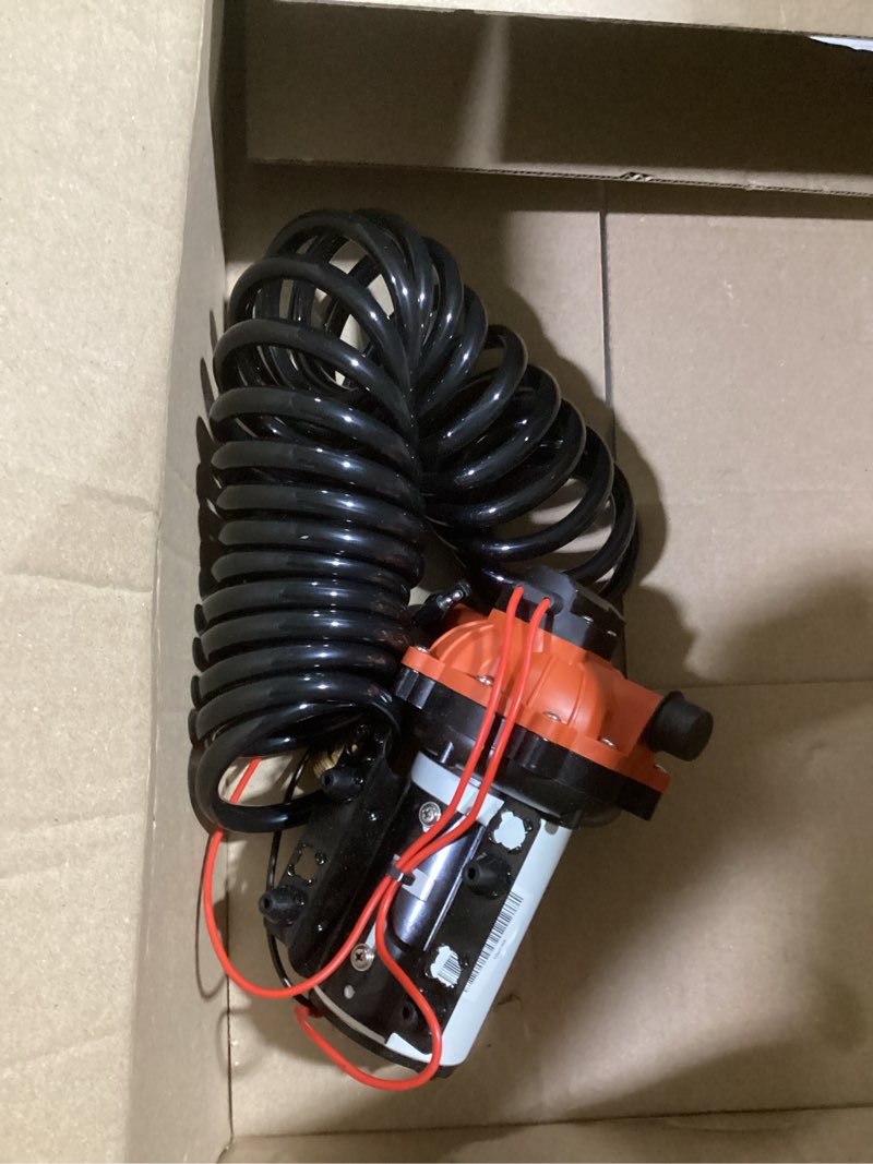 Condition photo showing As Is for seaflo 55-series washdown pump kit - 12v dc, 5.5 gpm, 70 psi, self-priming, coiled hose, spray nozzle, high flow for rv, boat, off-grid, freshwater, and saltwater applications 4-year warranty diaphragm pump