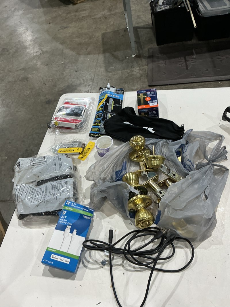 Condition photo showing As Is for assorted home improvement lot (small tools, screw, home accessories, etc.)