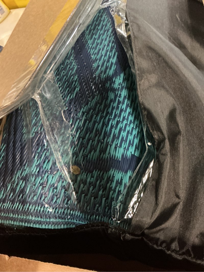 Condition photo showing As Is for genimo outdoor rug 9' x 12' waterproof for patios clearance, reversible outdoor plastic straw camping rug carpet, large area rugs mats for rv, camper, deck, balcony, porch, beach, navy blue&jade green navy blue & jade green | waterproof 9' x 12' (rectangular)