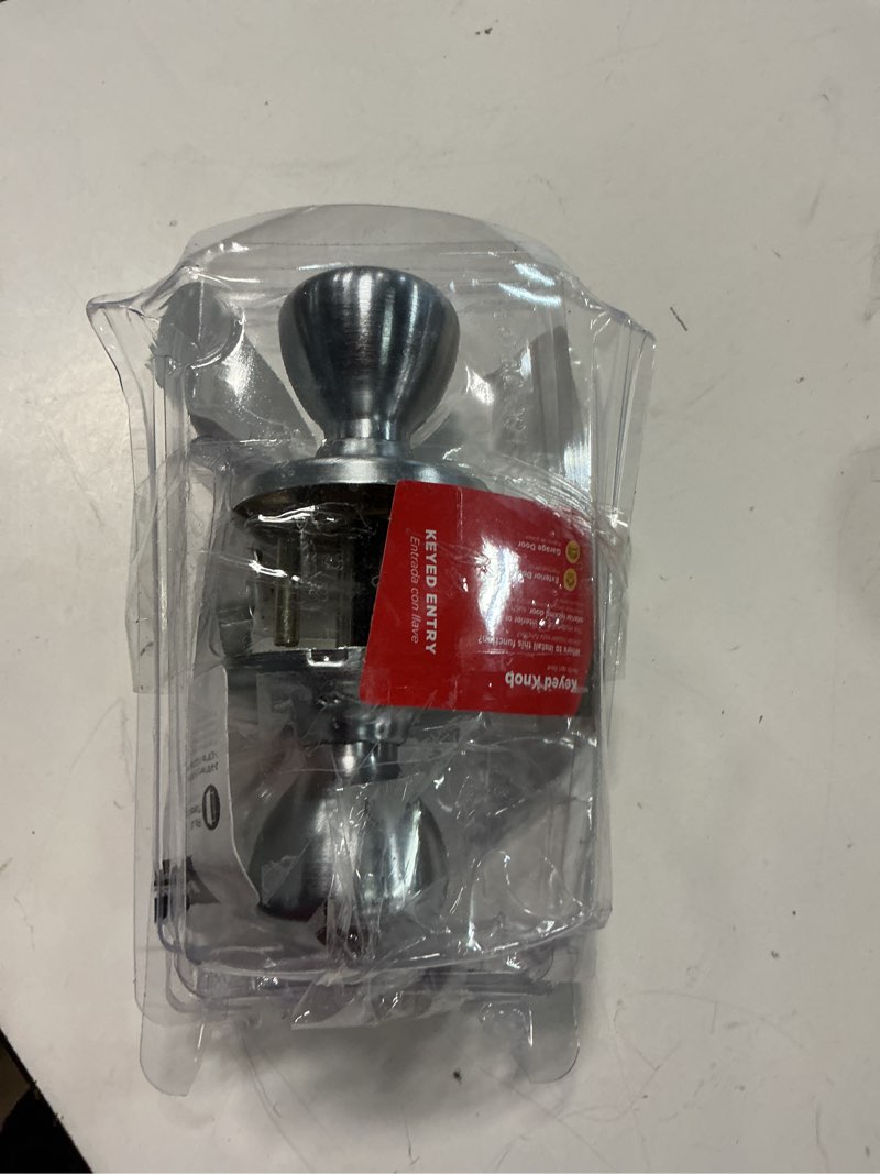 Condition photo showing As Is for kwikset tylo satin chrome entry door knob 1-3/4 in.