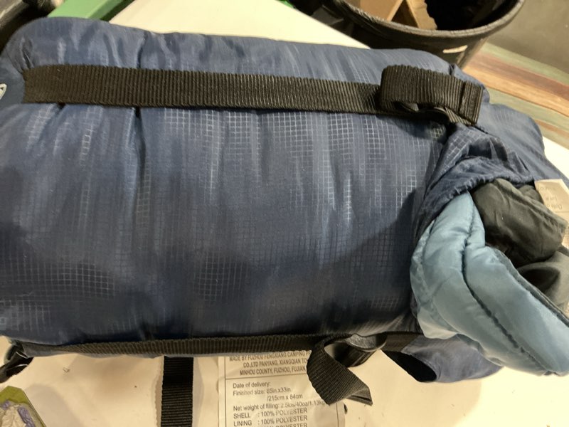 Condition photo showing As Is for ozark trail 10-degree cold weather mummy sleeping bag with soft liner, blue, 85\"x33\"