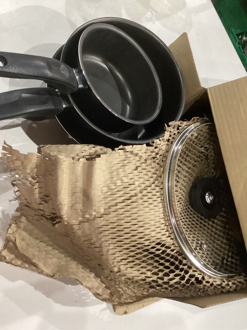 Condition photo showing As Is for incomplete mainstays  non stick aluminium, pots and pans cookware set, black