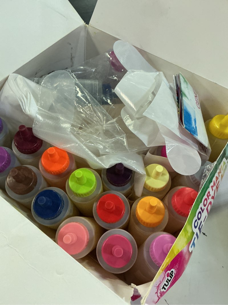Condition photo showing As Is for tulip one-step tie-dye color mania 36 vibrant colors, all-in-one tie dye kit for large groups, permanent fabric dye pre-filled bottles, gloves, instructions 36 dye bottles