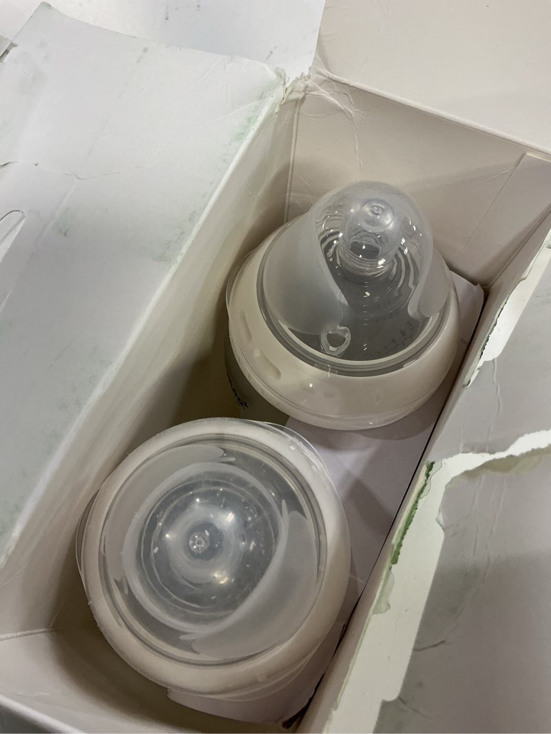 Condition photo showing New/Like New for tommee tippee silicone coated glass baby bottles for feeding, 9 0z, anti-colic, 0+ months, slow flow breast-like nipple, shatter-proof glass, bpa free, pack of 2 9 ounce clear