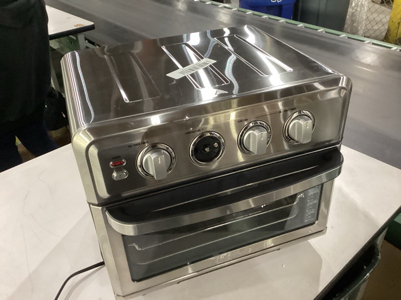 Condition photo showing As Is for  *Not Tested* Cuisinart Air Fryer Toaster Oven, 1800W, 8-in-1 with Air Fry, Convection, Broil & Warm, 0.6 Cubic Feet, 60-Minute Timer, TOA-70NAS, Stainless Steel Stainless Steel Convection Toaster Air Fryer Oven w/ Grill