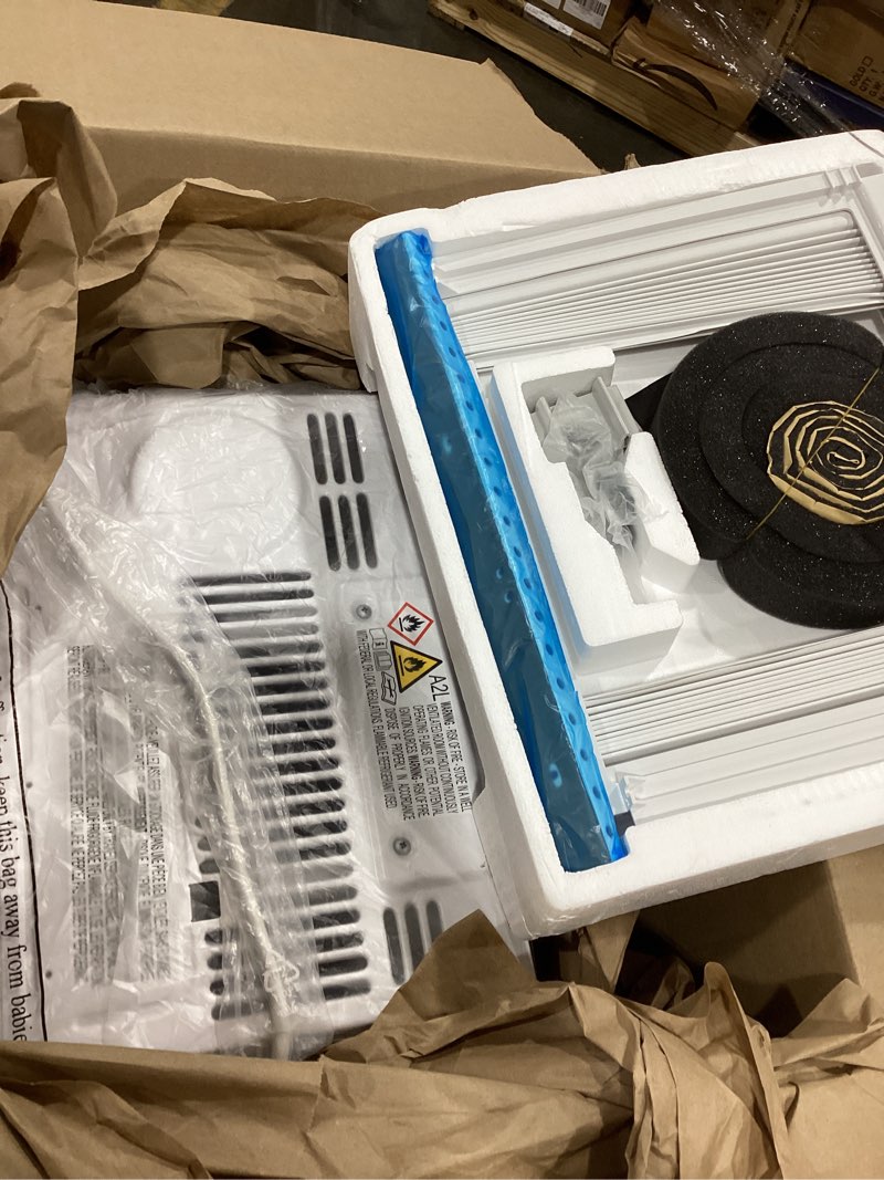 Condition photo showing Good Condition for frigidaire 5,000 btu window-mounted air conditioner, cools up to 150 sq. ft., quiet operation, effortless temperature control, 2 fan speeds, auto restart, white 5,000 btu mechanical controls