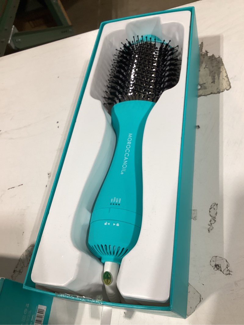 Condition photo showing New/Like New for moroccanoil effortless style 4-in-1 blow-dryer brush blow dryer brush