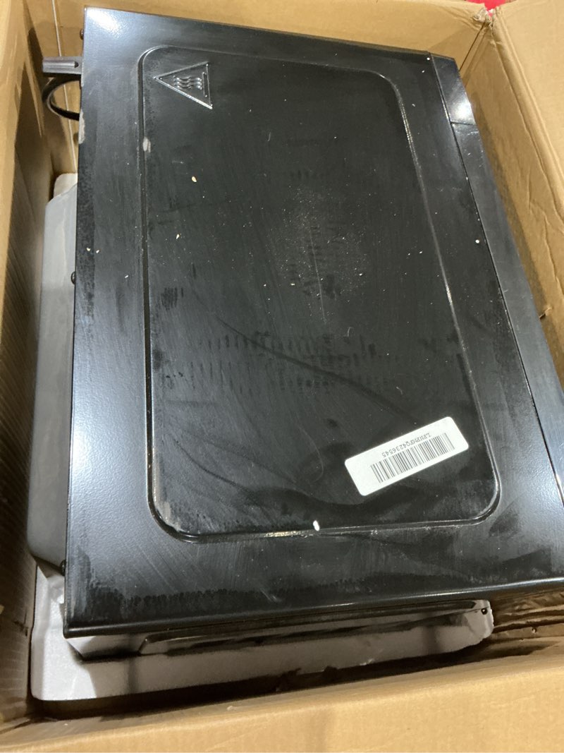 Condition photo showing As Is for chefman countertop microwave oven 1.1 cu. ft., 1000 watts with 10 power levels, 6 cooking presets with one-touch express cook, eco mode, child safety lock, & mute button - black
