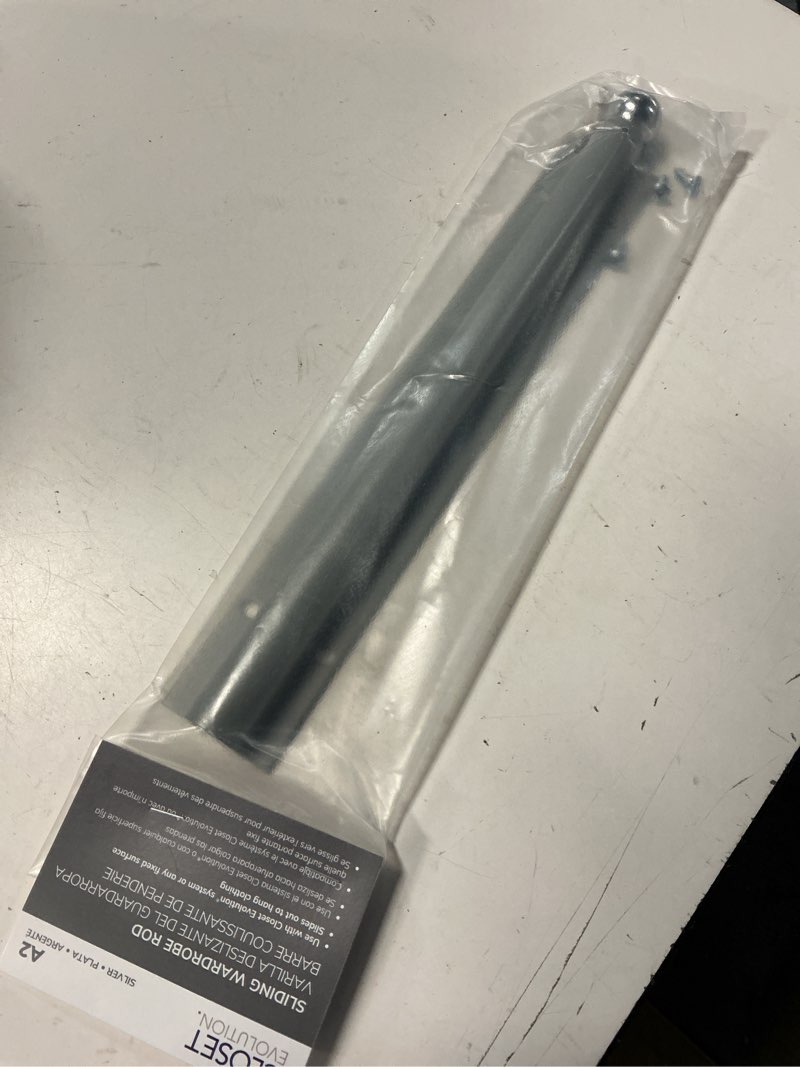 Condition photo showing New/Like New for 14 in. w sliding silver closet valet rod