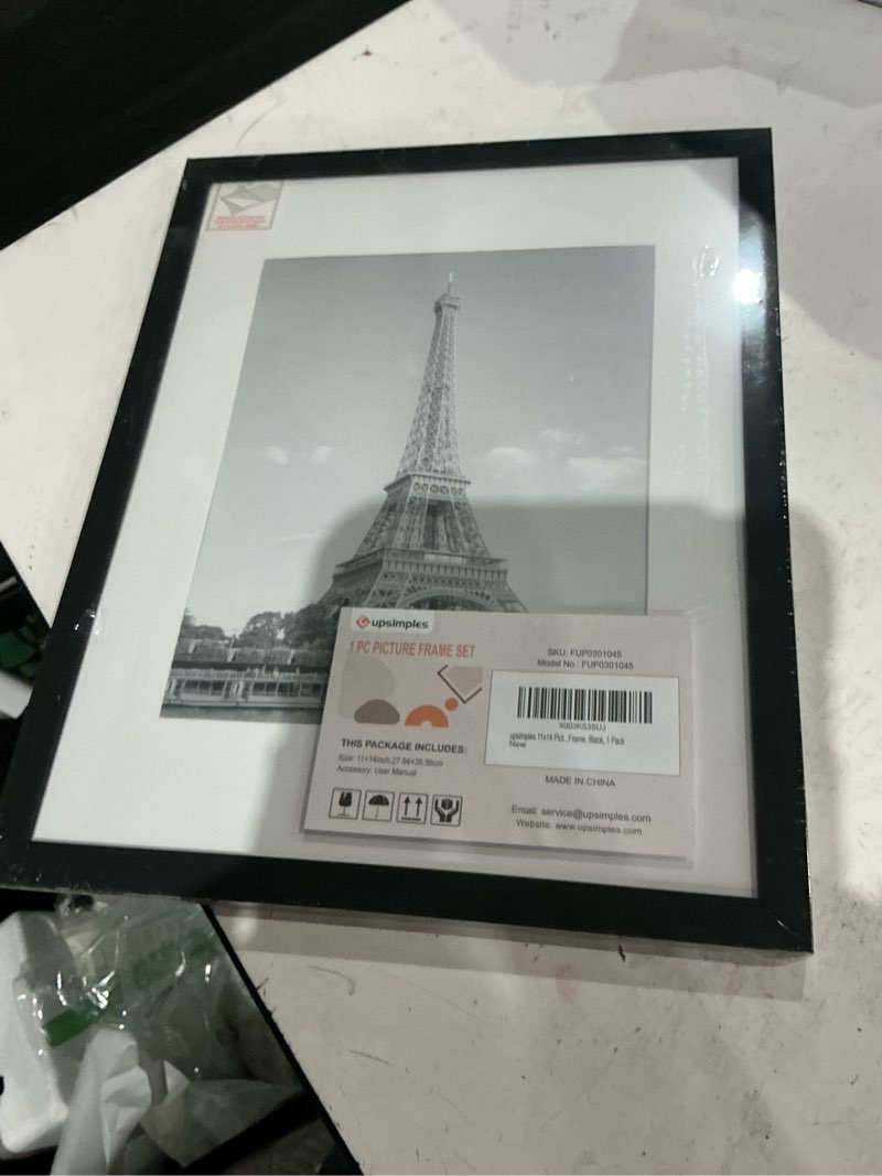 Condition photo showing Good Condition for upsimples 11x14 picture frame, display pictures 8x10 with mat or 11x14 without mat, wall hanging photo frame, black, 1 pack black 11x14