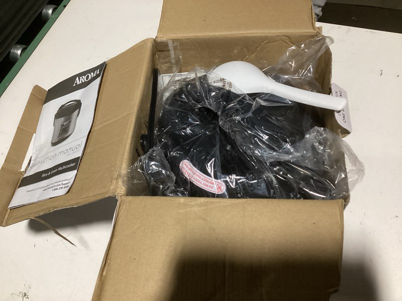 Condition photo showing Good Condition for AROMA Digital Rice Cooker, 4-Cup (Uncooked) / 8-Cup (Cooked), Steamer, Grain Cooker, Multicooker, 2 Qt, Stainless Steel Exterior, ARC-914SBD 4 Cup Uncooked / 8 Cup Cooked