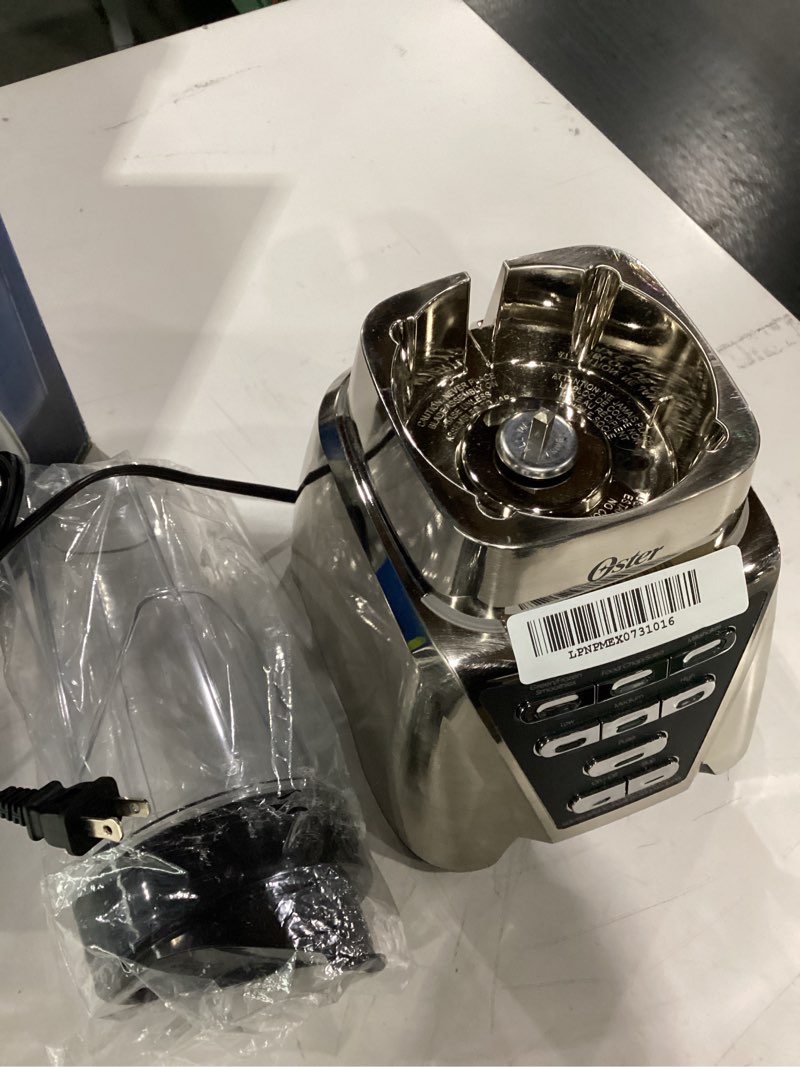 Condition photo showing Good Condition for Oster Pro 1200 Smoothie Blender with Glass Jar & 24oz To-Go Cup, Countertop Kitchen Blender with 7 Speeds, 1200W Power, Brushed Nickel