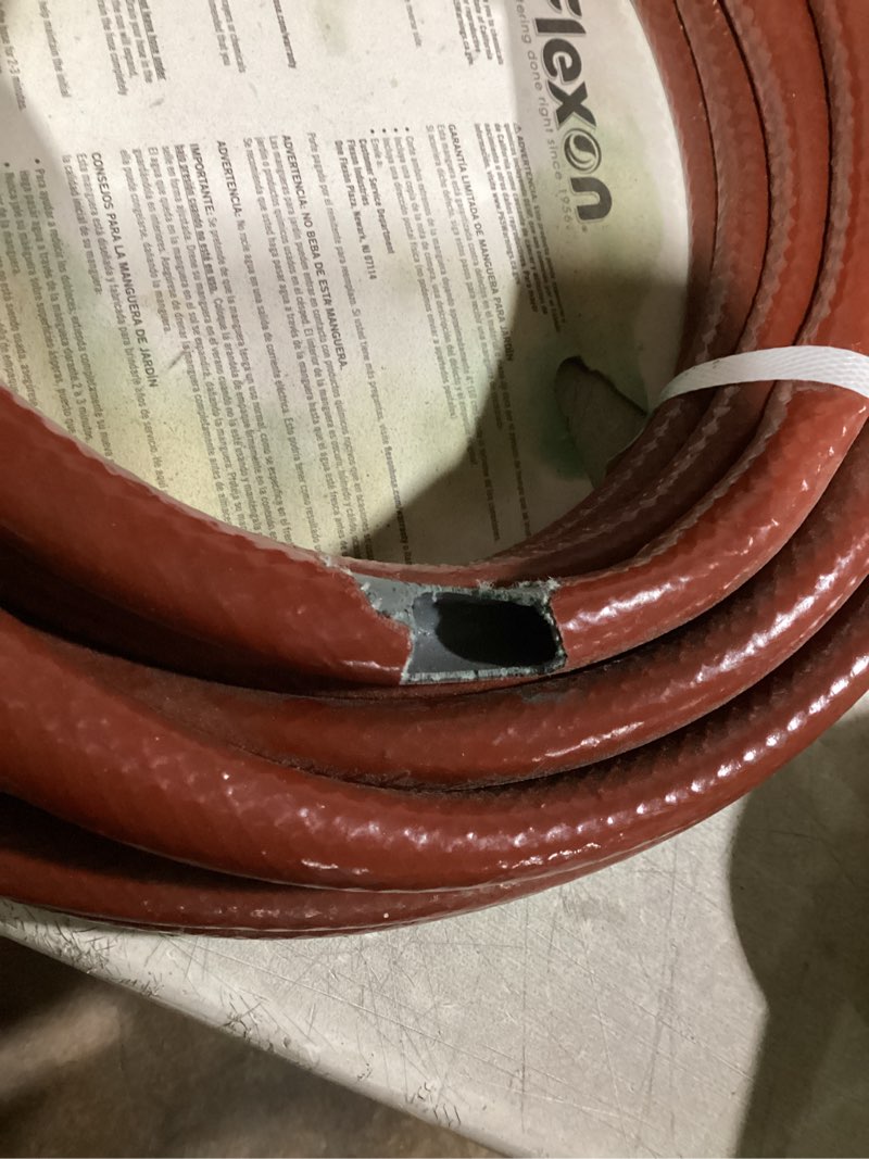 Condition photo showing As Is for needs repaired.. flexon 5/8-in x 50-ft medium vinyl blue hose