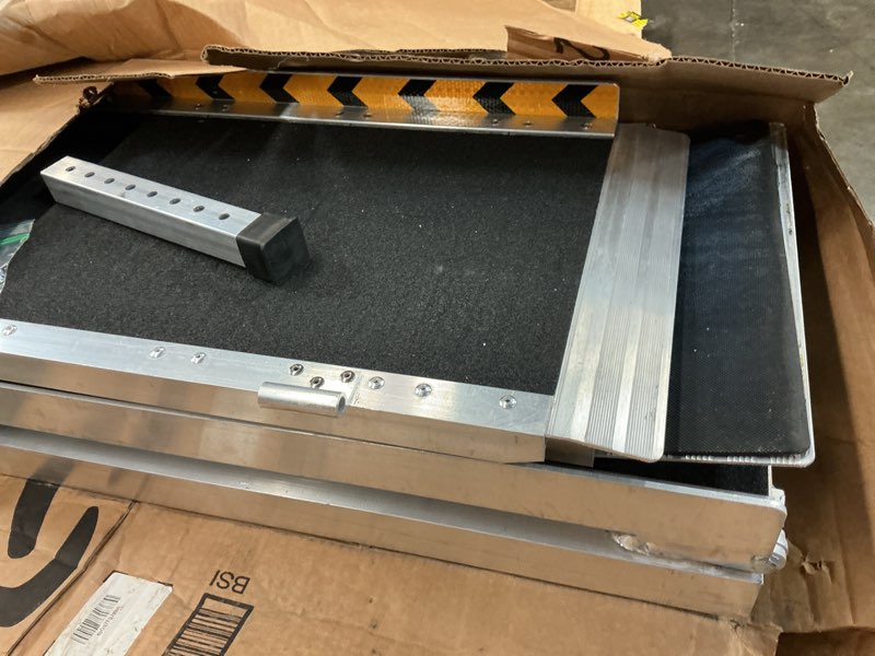 Condition photo showing As Is for portable wheelchair ramps 