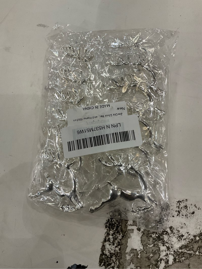 Condition photo showing New/Like New for ZeeDix Silver Reindeer Christmas Napkin Rings Set of 12, Napkin Holder Ring for Christmas Dinner Table Decor Cloth Napkins, Wedding Receptions, Holiday Party, Banquet and Home Kitchen 12 Silver Deer