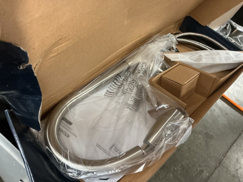 Condition photo showing As Is for project source tucker stainless steel single handle pull-down kitchen faucet with sprayer (deck plate included)