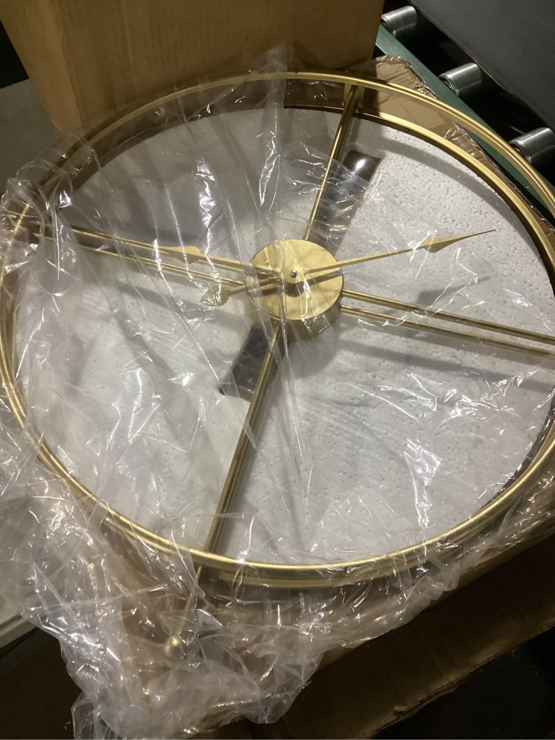 Condition photo showing As Is for gold brass wall clock 24 inch wall clocks for living room decor mordern decorative clock minimalism non ticking battery operated metal clock for living room kitchen and office gold 24"