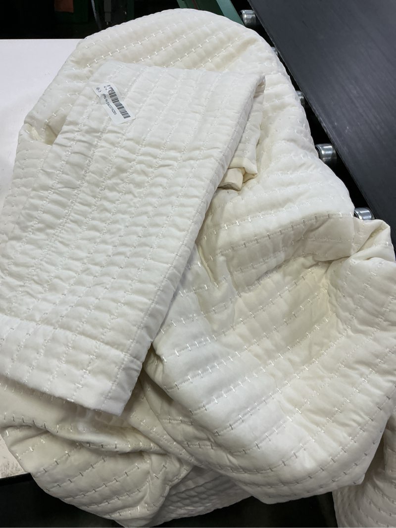 Condition photo showing As Is for great bay home twin size velvet quilt and sham set - dual-sided luxury velvet, heavyweight 2-piece bedding set - ultra soft, quilted box-stitched and down-alternative fill (twin/twin xl, cognac) twin / twin xl 02 - velvet cognac
