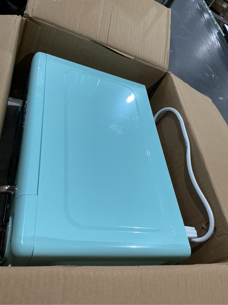 Condition photo showing Good Condition for nostalgia countertop microwave oven with easy clean interior - retro microwave with led display & child lock- compact 0.7 cu. ft. oven with 12 pre-programmed settings for quick cooking- 700-watts-aqua retro classic 0.7 cu. ft. aqua