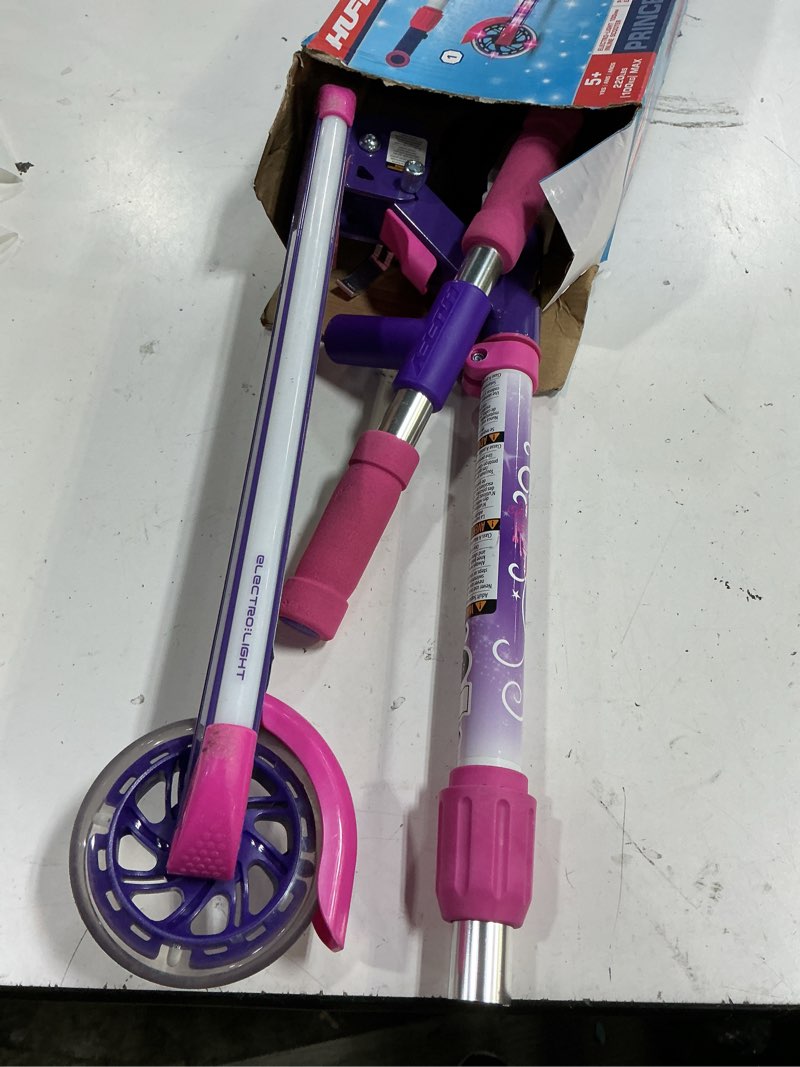 Condition photo showing Good Condition for huffy light up inline scooter for kids, 2 wheel kick scooter with led lights and rear brake, foldable, adjustable handlebar on select models, durable frame, licensed character graphics disney princess