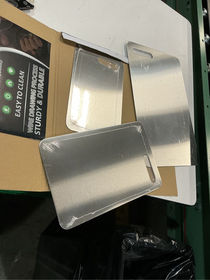 Condition photo showing New/Like New for titanium cutting boards set of 3, 100% pure titanium kitchen cutting board, double-sided non-toxic cutting board, ideal for slicing and dicing meats, features handle, dishwasher safe silver 16"l*10"w(s+m+l)