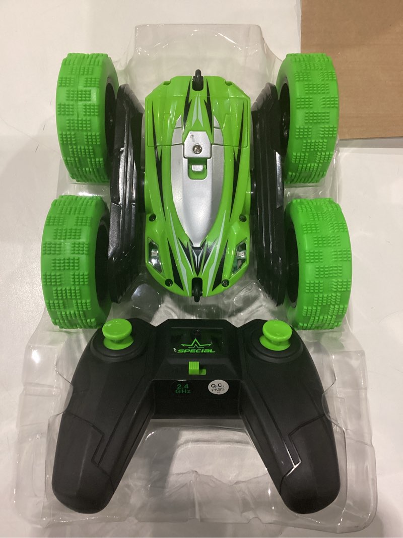 Condition photo showing As Is for GREEN ONLY Lumiparty  RC Stunt Car Remote Control Car for Kids, 2.4Ghz High Speed Rock Crawler Vehicle,360 Rotating 4WD Off Road Double Sided Rotating Tumbling Rc Car with 4 Rechargeable Battery.