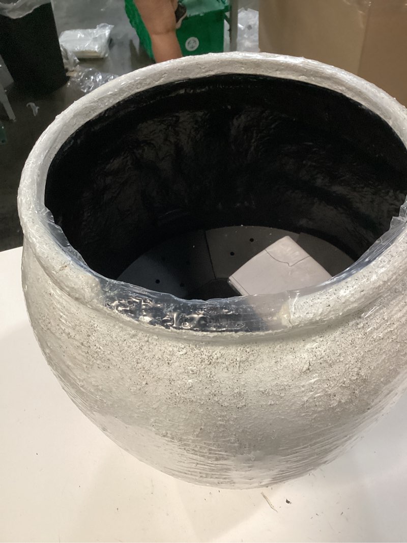 Condition photo showing As Is for allen + roth round 16.25-in w x 16.25-in l white stone outdoor self watering planter
