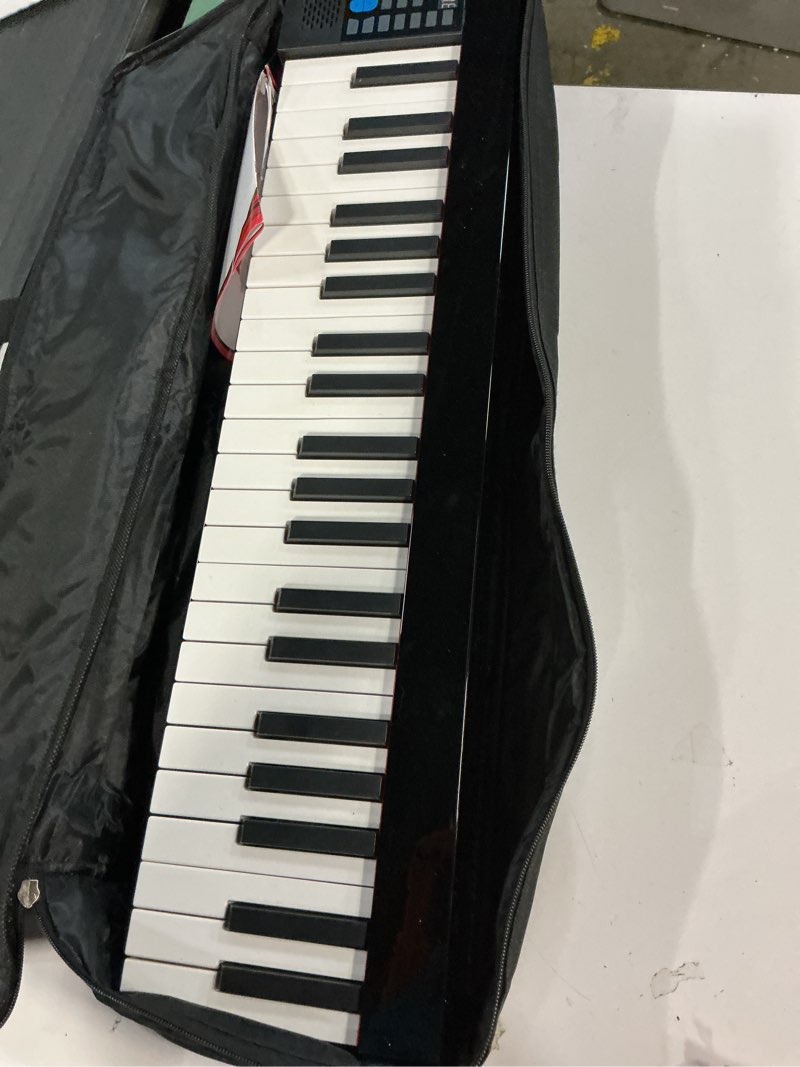 Condition photo showing Good Condition for Pyle Electric Keyboard Piano 88 Keys - Portable Foldable Digital Piano Keyboard With Bluetooth, 128 Rhythms/Tones,Semi weighted keys, Sustain Pedal, Piano Bag - for Beginners, Kids,Adult -PKBRD8100 Foldable Electric Piano