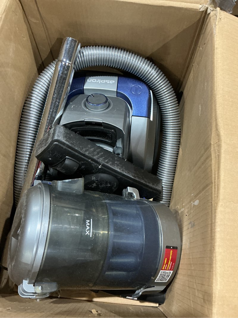 Condition photo showing As Is for aspiron 1700w canister vacuum cleaner, 45kpa bagless vacuum cleaner, multi-cyclonic filtration, 2 anti-allergen hepa filters, 3.5qt dust cup, 4 tools, corded vacuum for hard floor, pet hair, sapphire