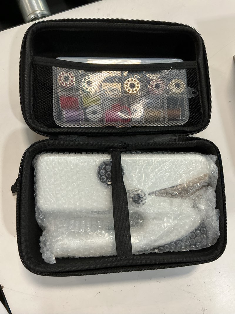 Condition photo showing New/Like New for unique sewing experience: handheld sewing machine with storage box, portable package,mini sewing machine for travel, including various accessories and tools?white?
