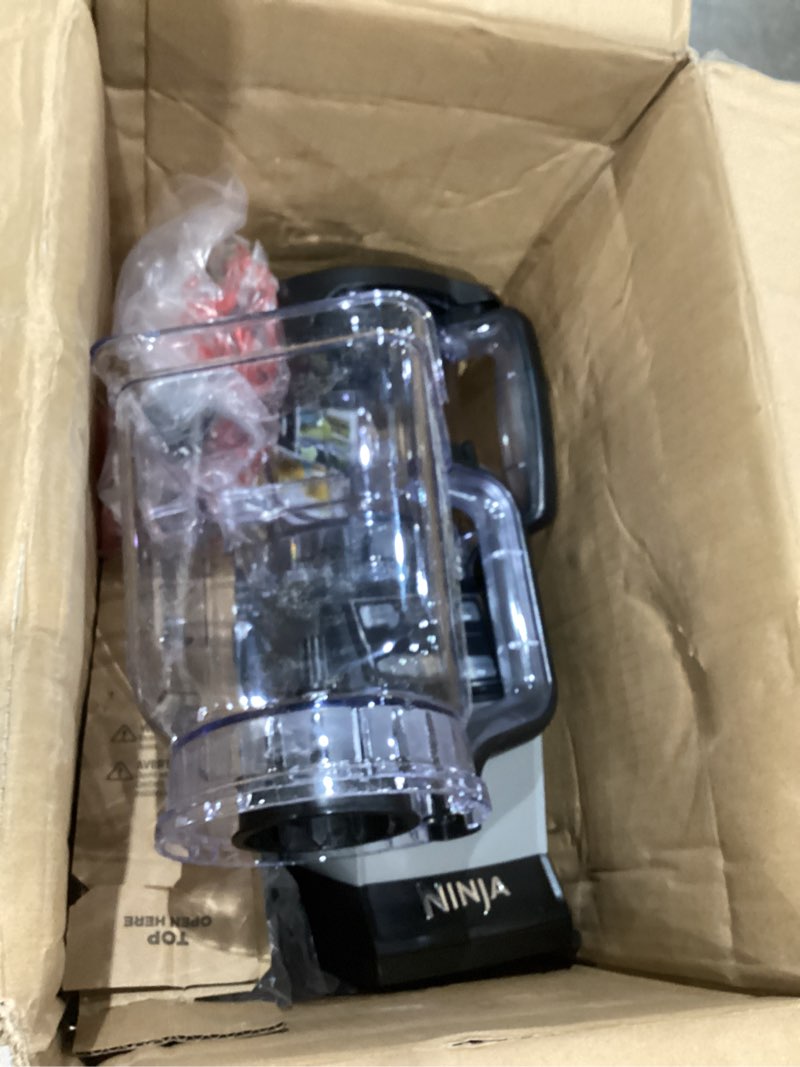 Condition photo showing As Is for ninja blender, compact kitchen system, 1200w, 3 functions for smoothies, dough & frozen drinks with auto-iq, 72-oz.* blender pitcher, 40-oz. processor bowl & 18-oz. single-serve cup, grey, amz493brn 1200 peak watts