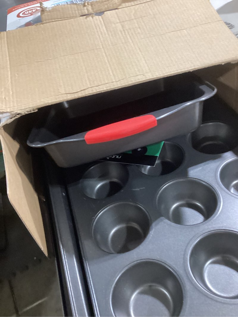 Condition photo showing Good Condition for NutriChef 6-Piece Nonstick Bakeware Set - Carbon Steel Baking Pans Set w/ Heatsafe Red Silicone Handles, Oven Safe Up to 450°F, Loaf Muffin Round/Square Pans, Cookie Sheet, Baking Pan -NCSBS6S,Black 6-Piece Set