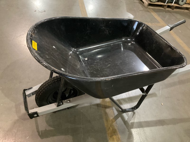 Condition photo showing As Is for steel wheelbarrow
