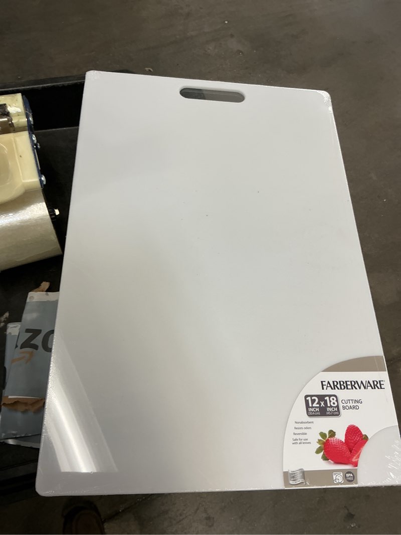 Condition photo showing New/Like New for farberware extra-large plastic cutting board, dishwasher- safe poly chopping board for kitchen meal prep with easy grip handle, 12-inch by 18-inch, white 18"l x 12"w cutting board