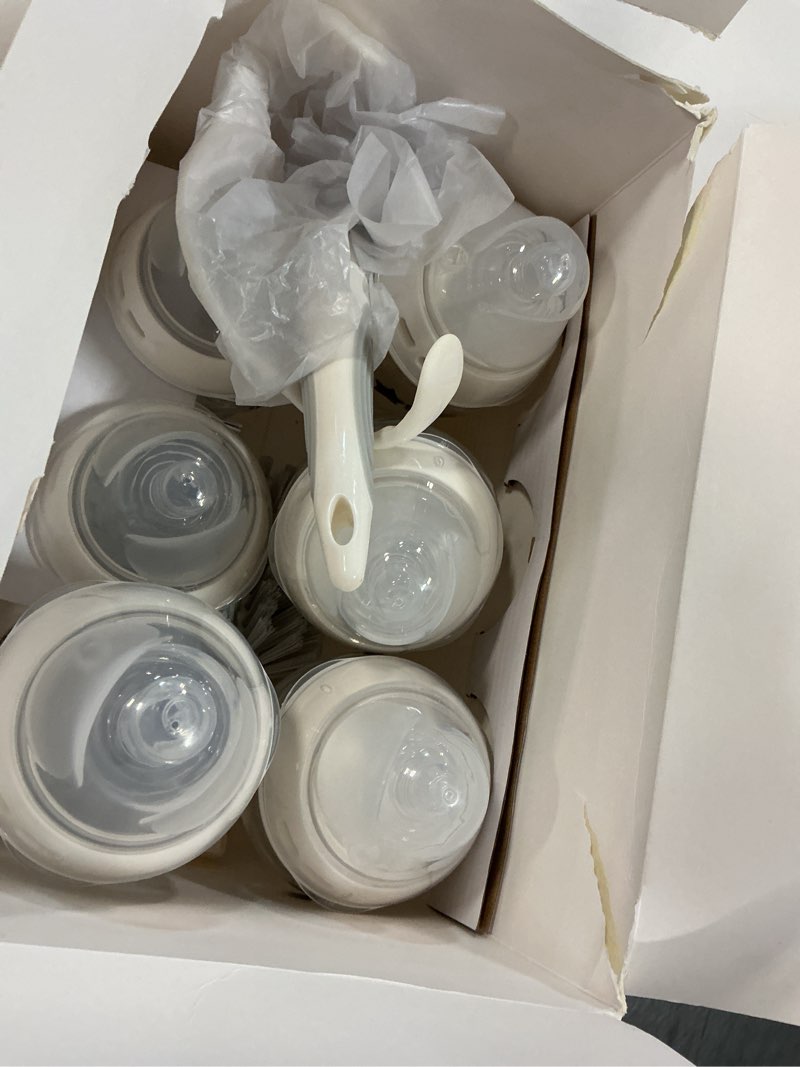Condition photo showing Good Condition for tommee tippee natural start grow with baby bpa free bottle 13 piece set, 2 x 5oz, 3 x 9oz and 1 x 11oz, slow, medium and thicker flow nipples, removable bottle handles 13 pieces clear