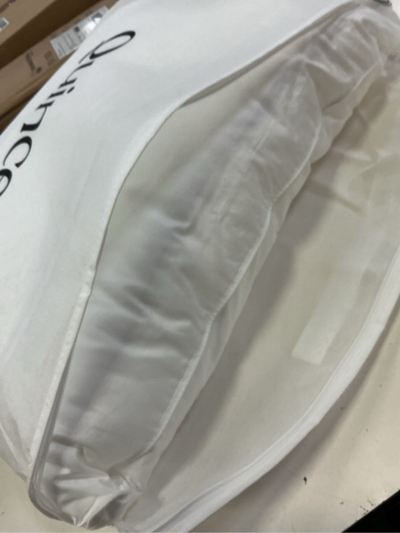 Condition photo showing As Is for premium down alternative pillow, standard, medium/firm