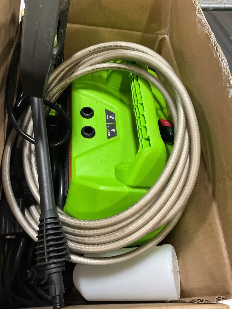 Condition photo showing As Is for greenworks 1800 psi 1.2-gpm cold water electric pressure washer with 2 spray tips