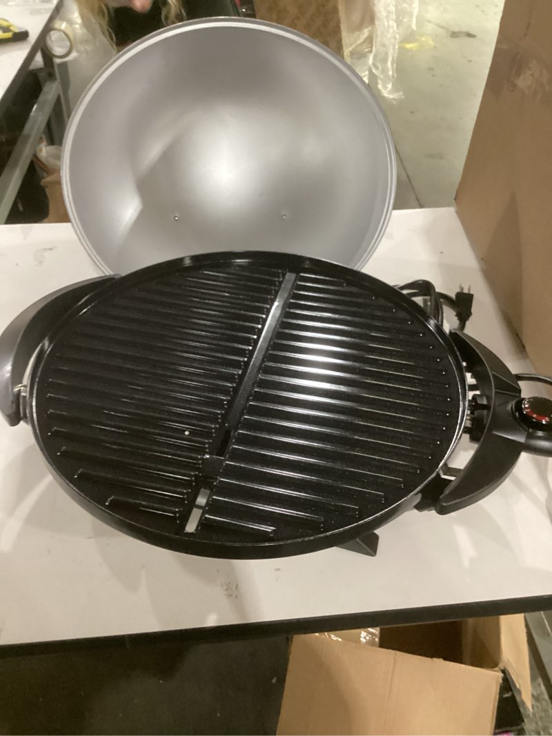 Condition photo showing As Is for not tested**** george foreman indoor/outdoor electric patio grill, apartment approved, 15-serving, removable stand, black electric grill black