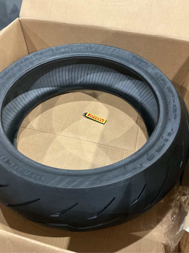 Condition photo showing As Is for pirelli diablo rosso 4 iv street sport 180/55zr17 rear motorcycle tire 180/55-17 w/keychain